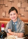 A person sitting at a tableAI-generated content may be incorrect.